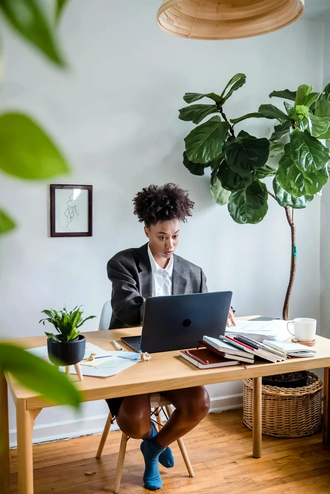 Independent professional focused on a desktop workspace.